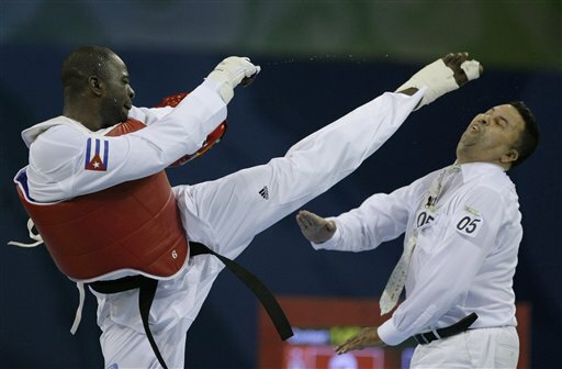 Taekwondo Champion Angel Valodia Matos Kicks Referee In the Head