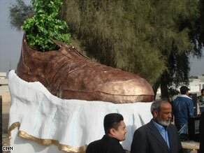 A Monument to a Shoe Thrown at George Bush Unveiled in Tikrit