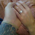 Photo of a Wedding Ring Worn by Esther Nazarov Holding Hand of Fred Durst