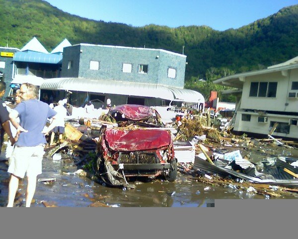 Photo of Cars and Buildings Crumbled After Tsunami in Samoa