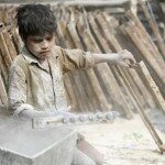 Photo of Small Boy Hard at Work in Bangladesh