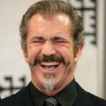 Mel Gibson Calls Dean Richards “Asshole” During Live Interview