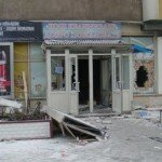 Kyrgyzstan Revolution Looting Photo - Hole Through the Brick Wall