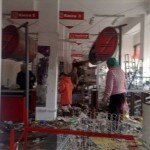 Kyrgyzstan Revolution Looting Photo - People Inside the Store Looking For Something to Steal