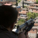 Brazilian Military Sniper Watching Over Rio de Janeiro Alemao Slums to Shoot at Drug Gangs