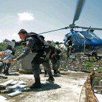 Loading Seized Cocaine into a Helicopter Over Alemao Slum in Rio de Janeiro