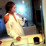 Miley Cyrus Cleavage Photo Self Shot in Bathroom